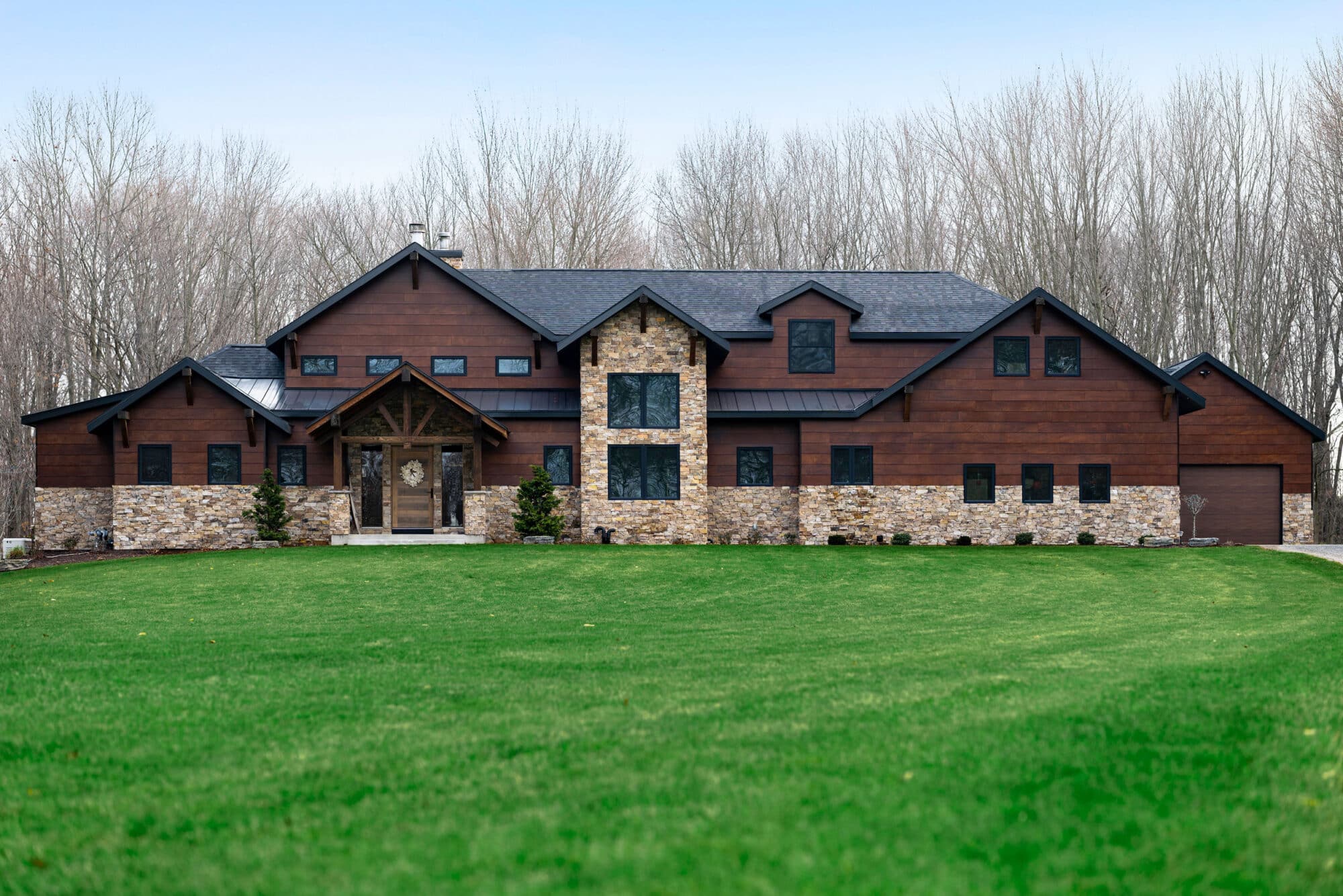 Natural wood siding with overlapping slats the Klein Residence 02