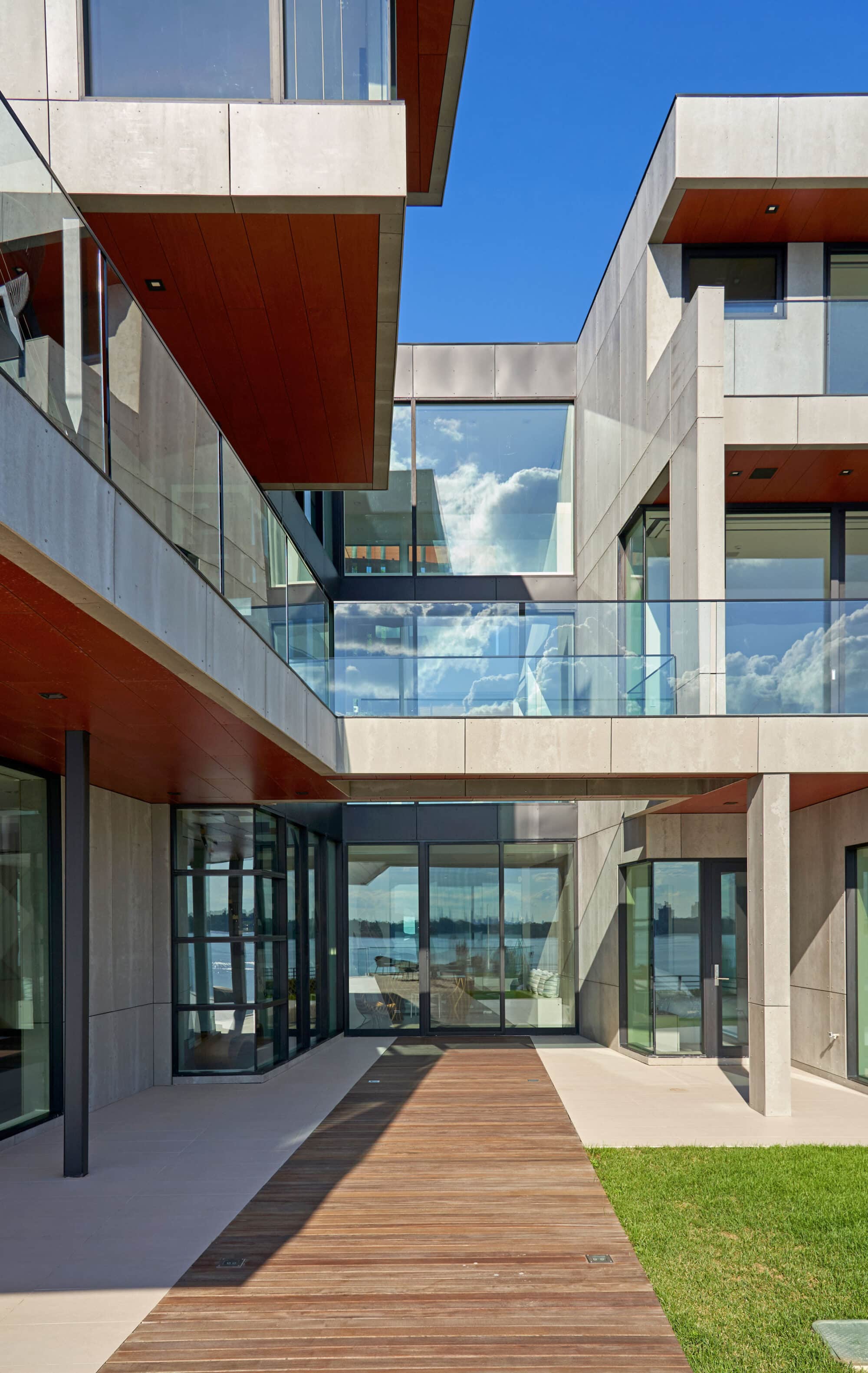 Natural timber cladding and interior panelling at Cliffside Residence 04