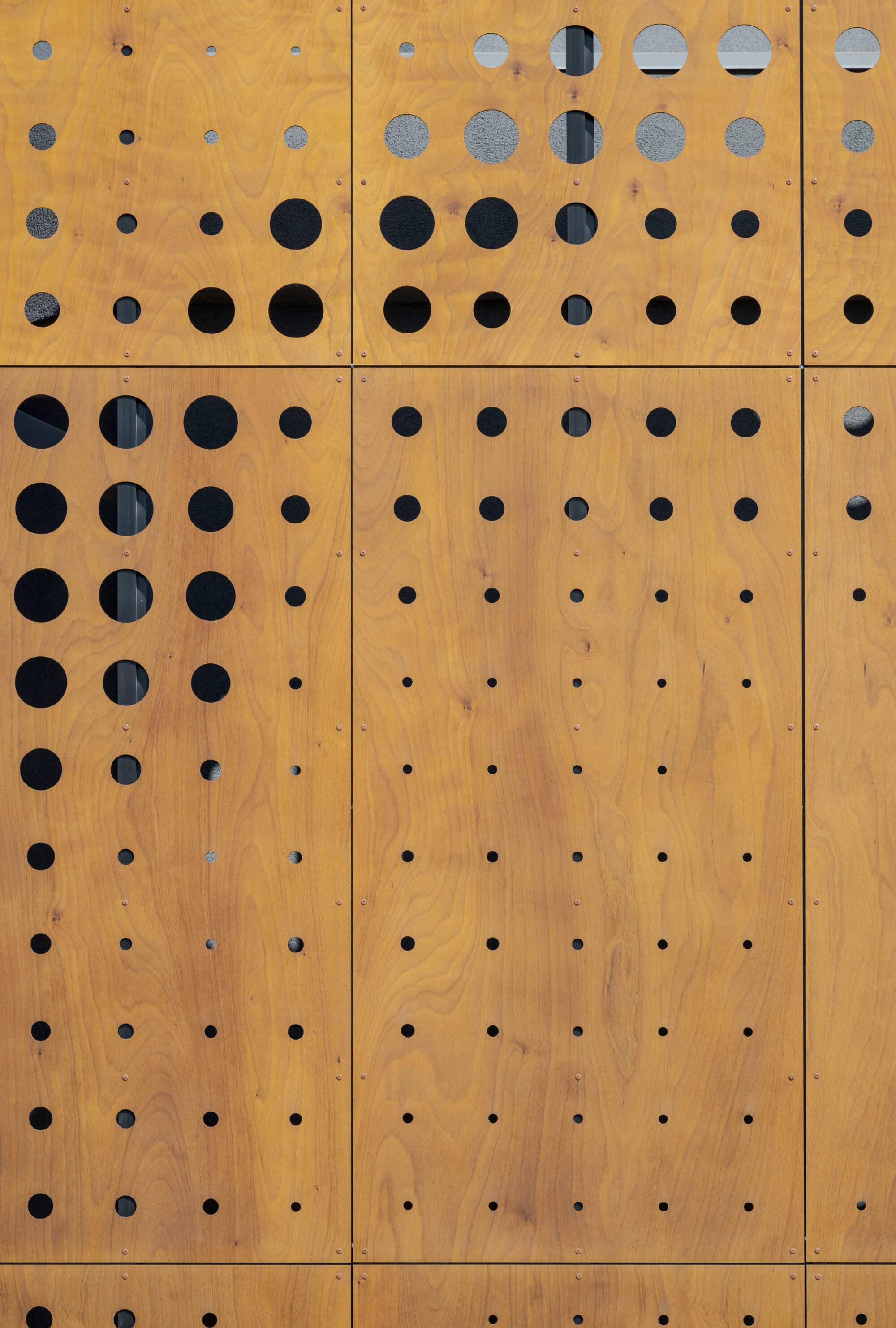 Perforated wood facade in Sessions by the Bay 03