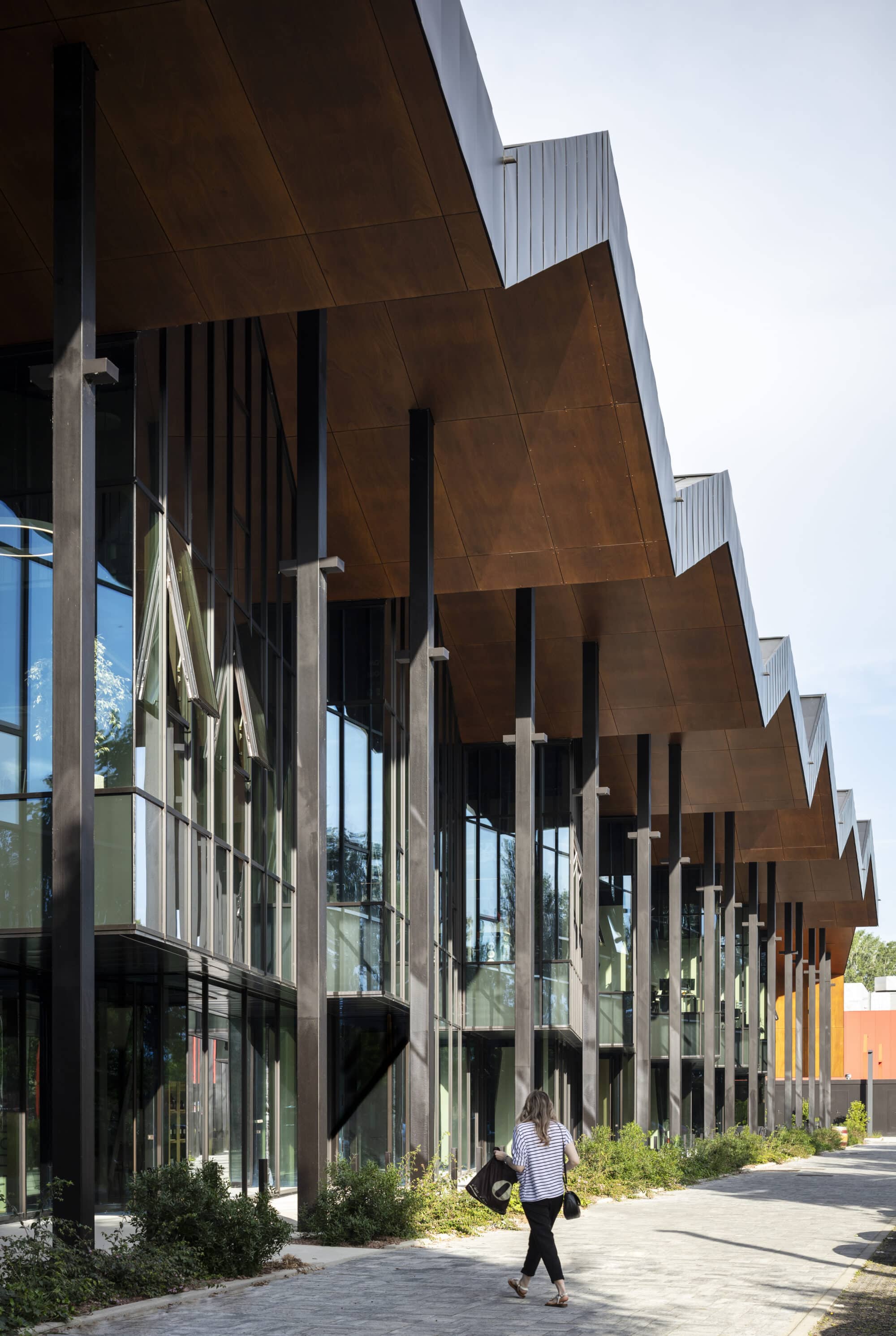 Wood panels for exterior false ceiling in BolognaParco Commerciale Borgo Mascarella 01
