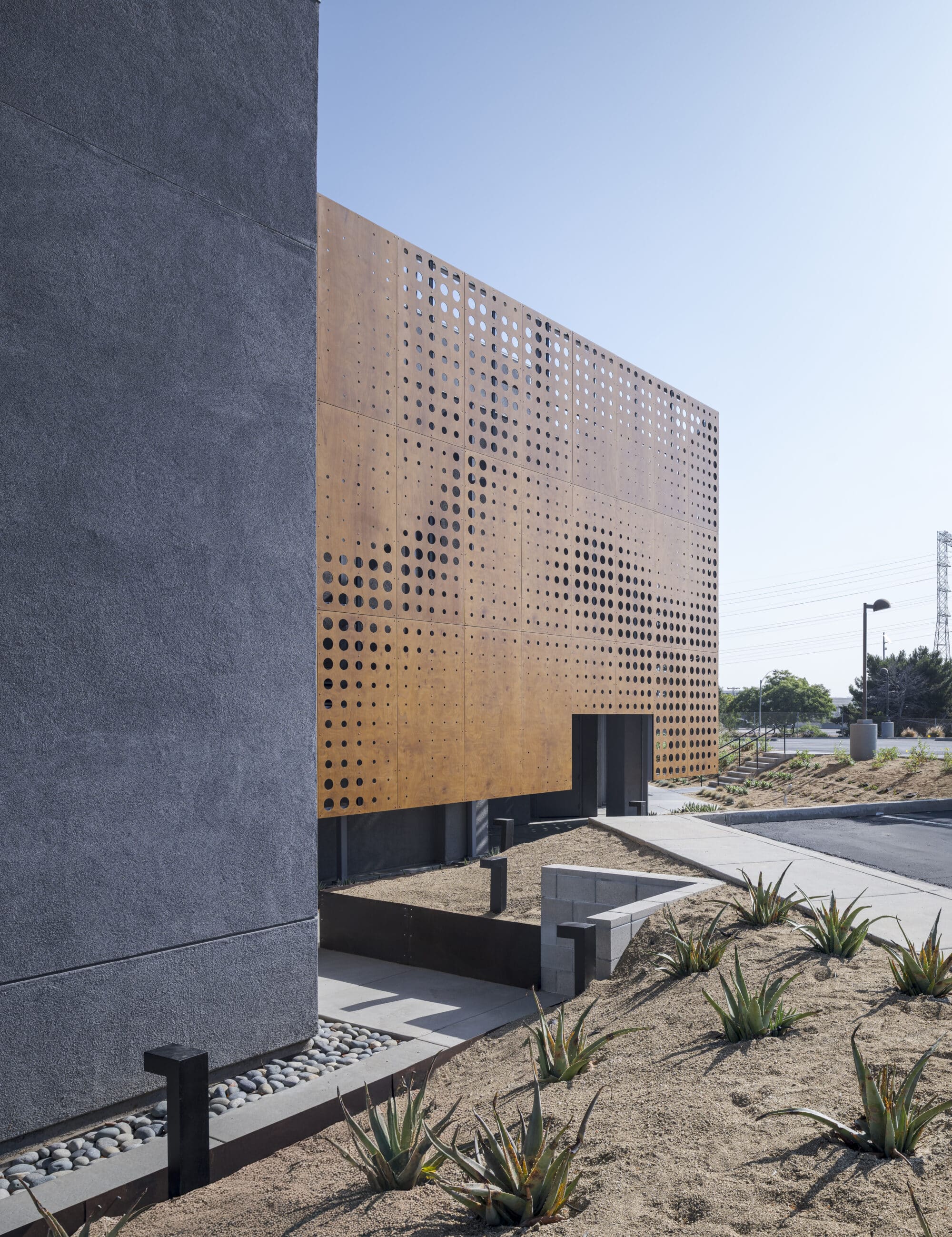 Perforated wood facade in Sessions by the Bay 04