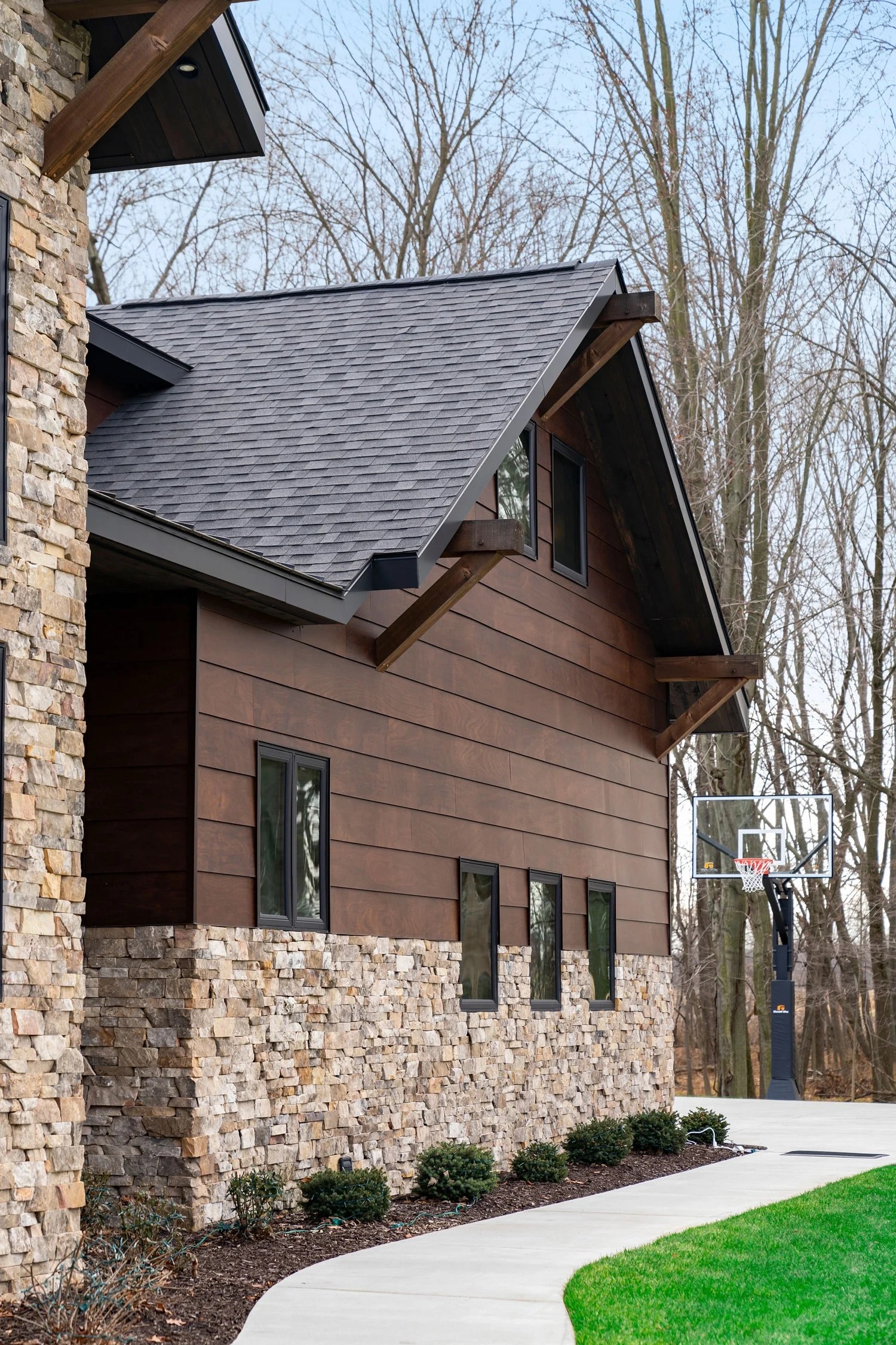 Natural wood siding with overlapping slats the Klein Residence 04