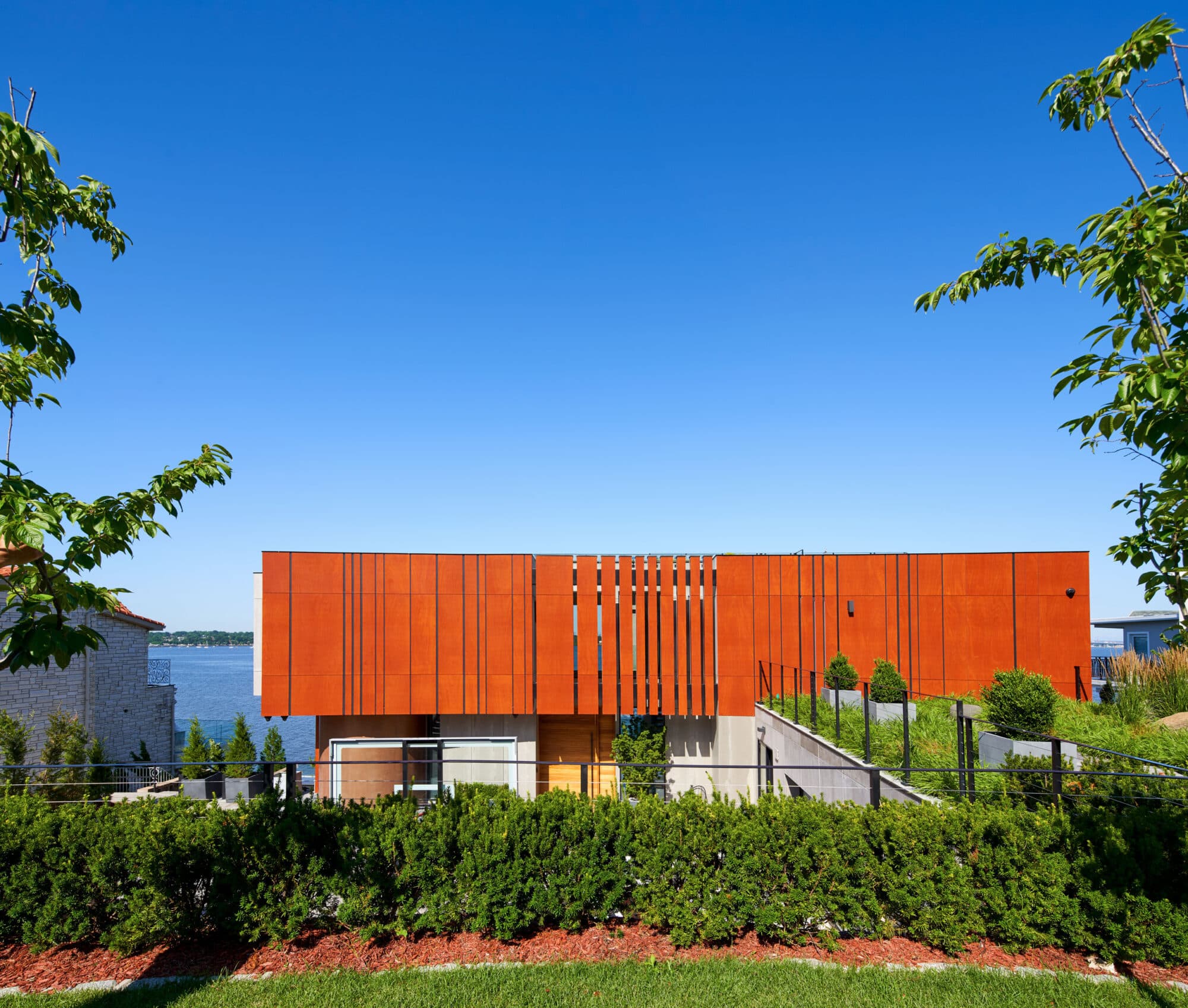 Natural timber cladding and interior panelling at Cliffside Residence 06